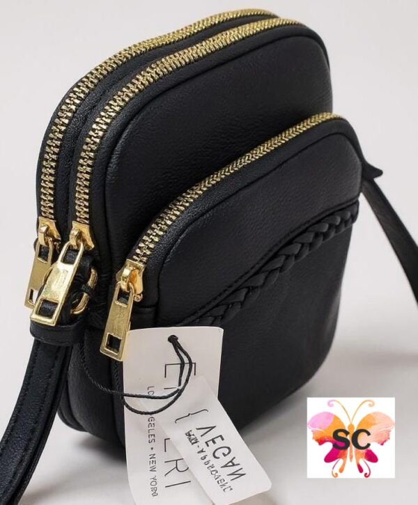 Black Cute Sling with many compartments.